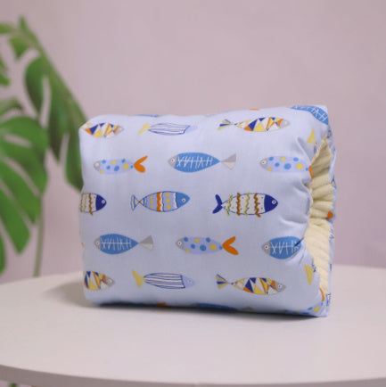 Breastfeeding arm pillow flat lay showing soft padded design
