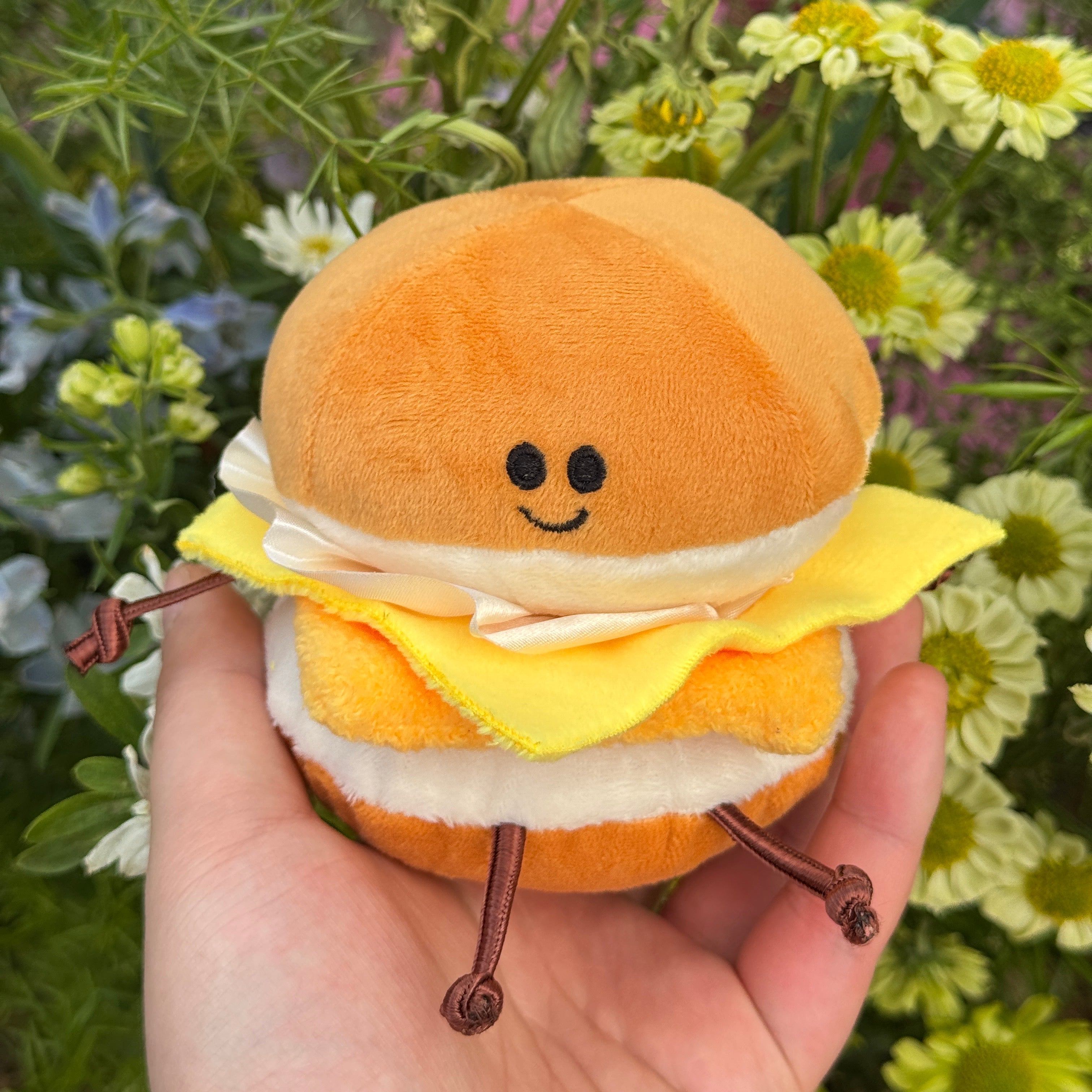 Plush burger toy in nursery decor