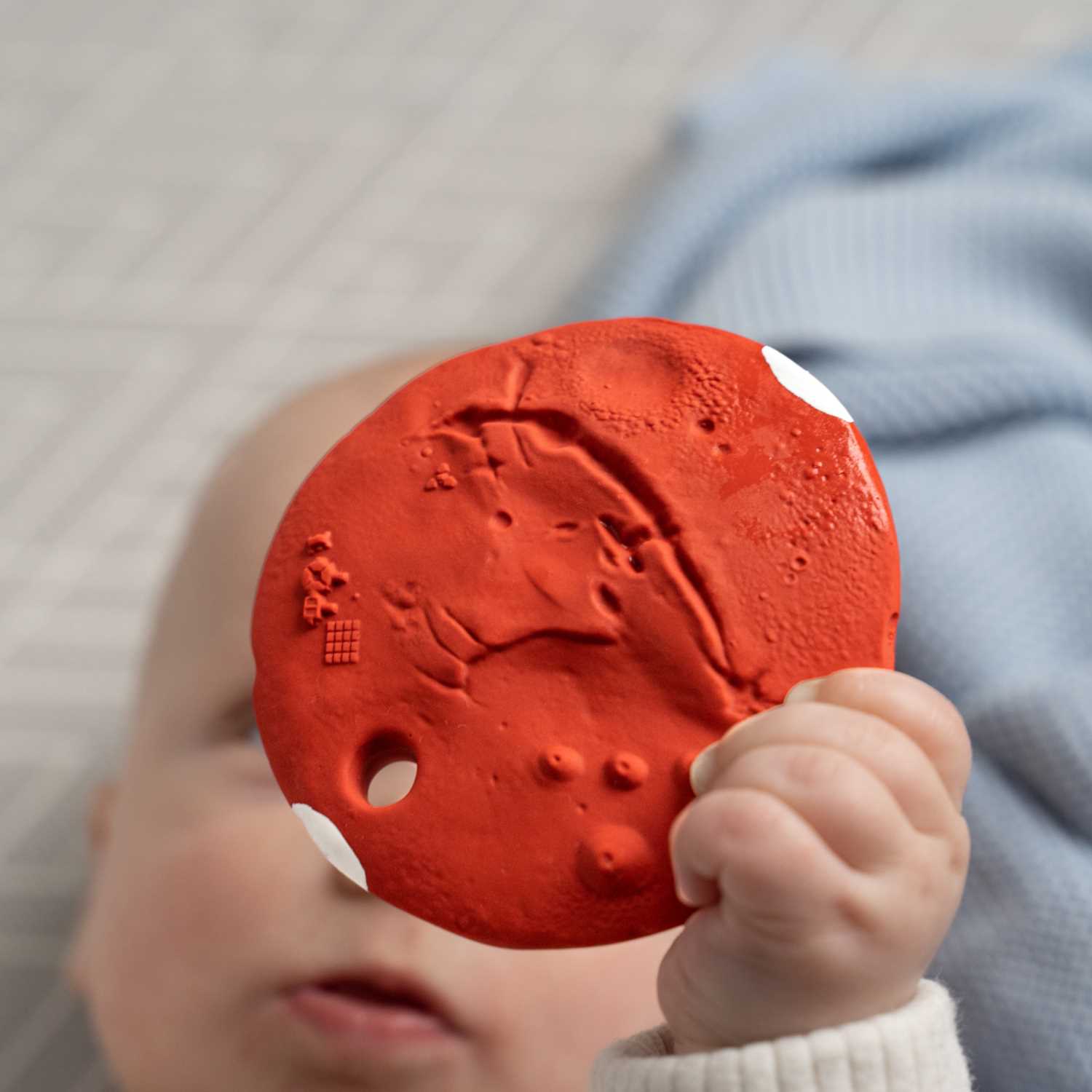 Space themed baby toy made from natural rubber