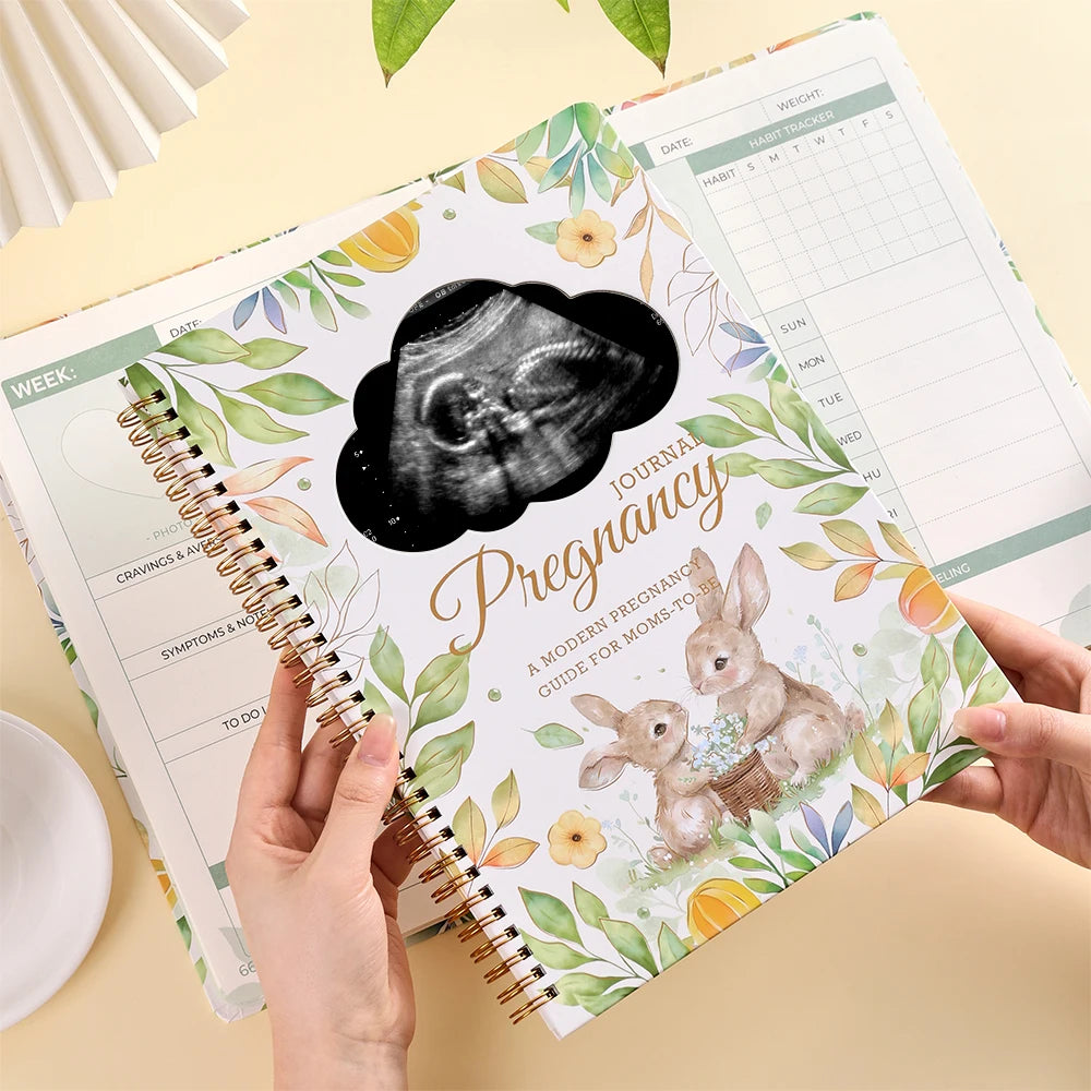 Weekly pregnancy planner pages inside first time mum memory book